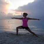 Yoga on the beach in Cayman – Warrior 2 pose